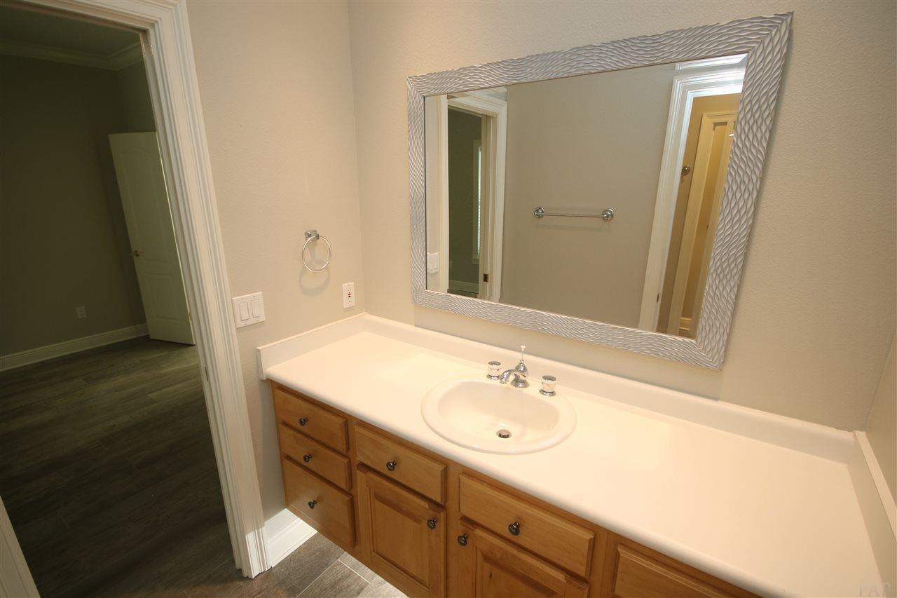6021 Otter Point Road Pensacola, FL 32504 - Photo 44 of 50 the J & J bath. Vanity has under cabinet lighting.