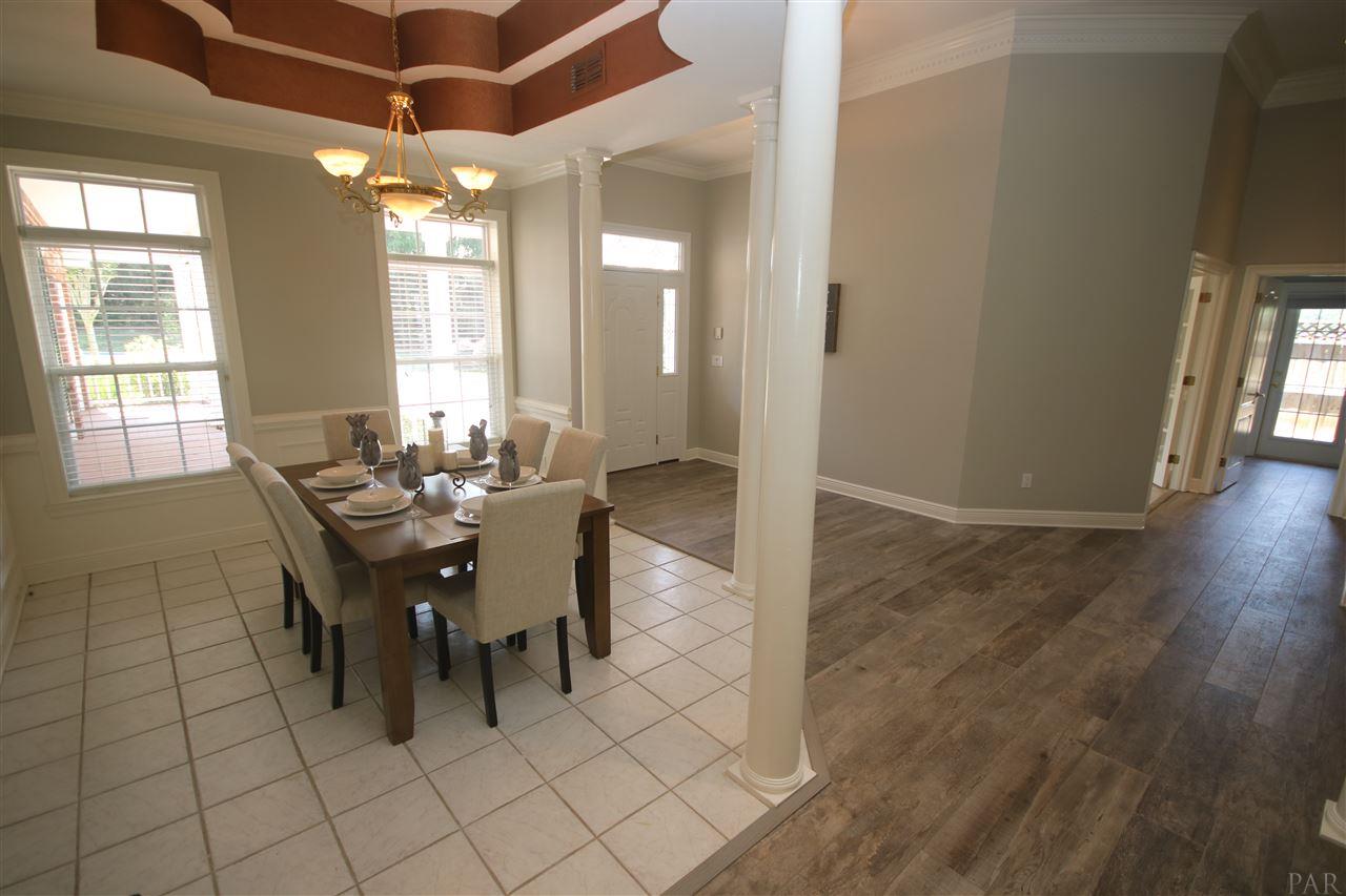 6021 Otter Point Road Pensacola, FL 32504 - Photo 8 of 50 Master suite at the end of the hallway to the (R).