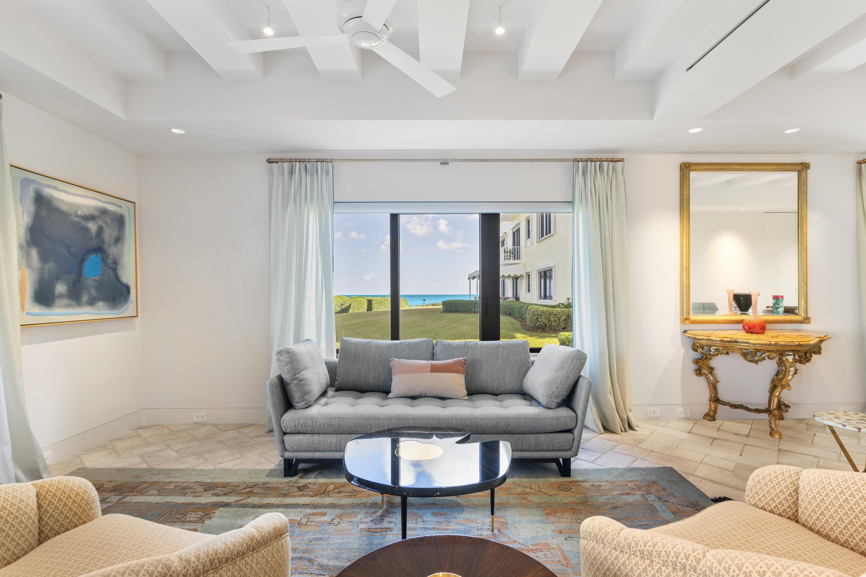 11202 Turtle Beach Road, Unit 104B North Palm Beach, FL 33408 - Photo 1 of 20 Living Room