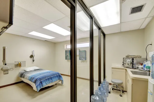 a room with furniture and a wooden floor