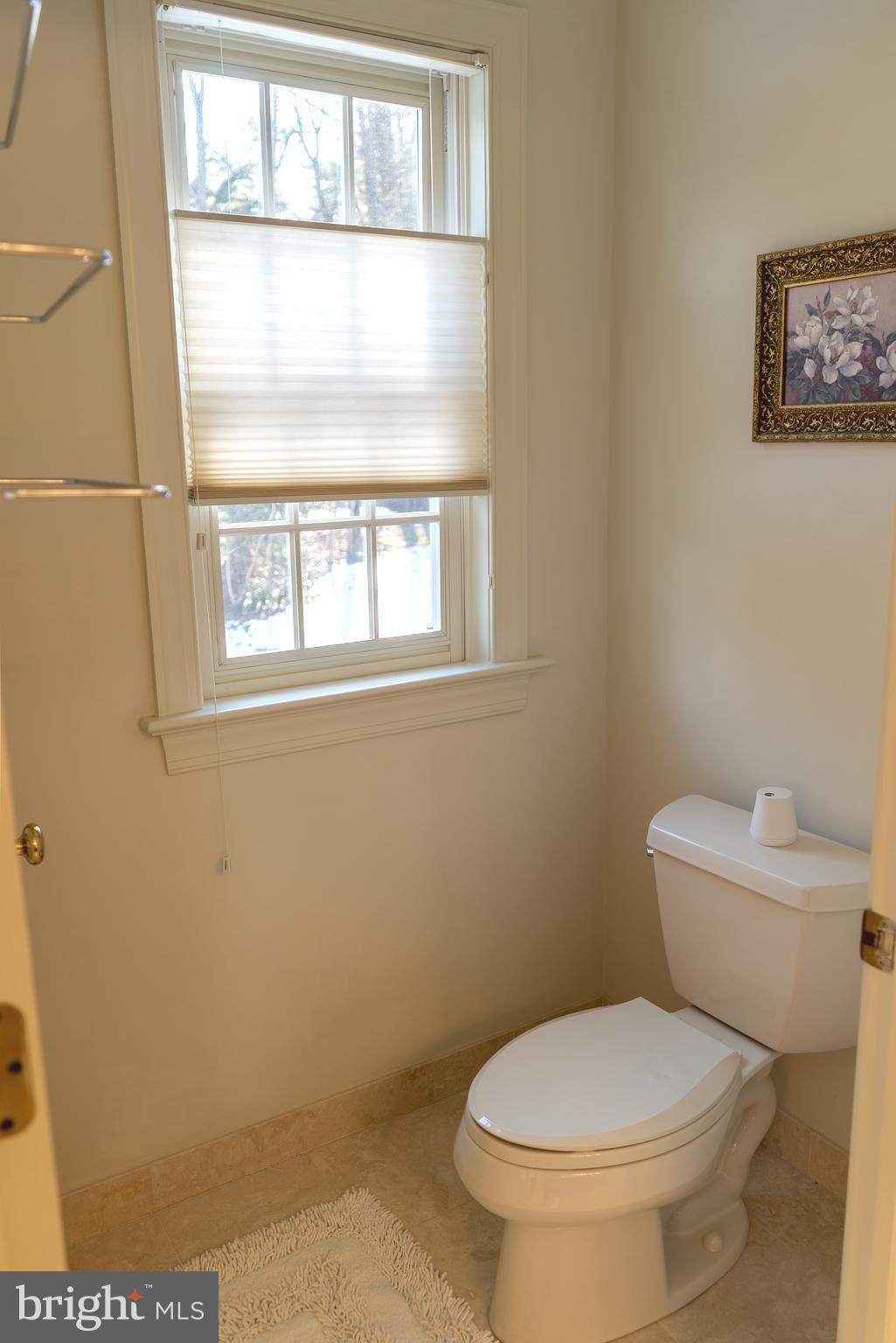 1160 Jefferson Lane Huntingdon Valley, PA 19006 - Photo 44 of 98 a white toilet sitting next to a bathroom sink