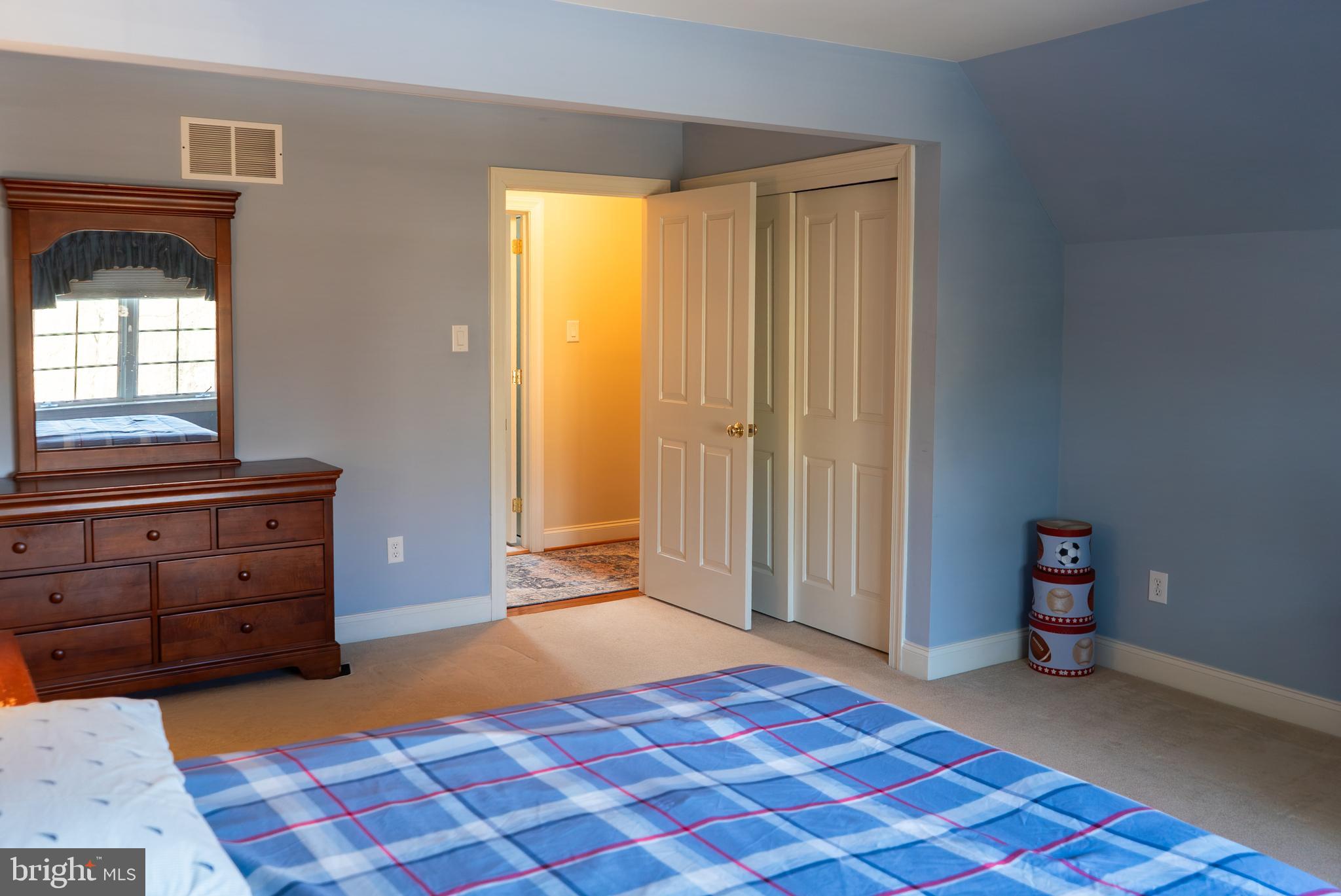 1160 Jefferson Lane Huntingdon Valley, PA 19006 - Photo 56 of 98 a bedroom with a bed and a dresser