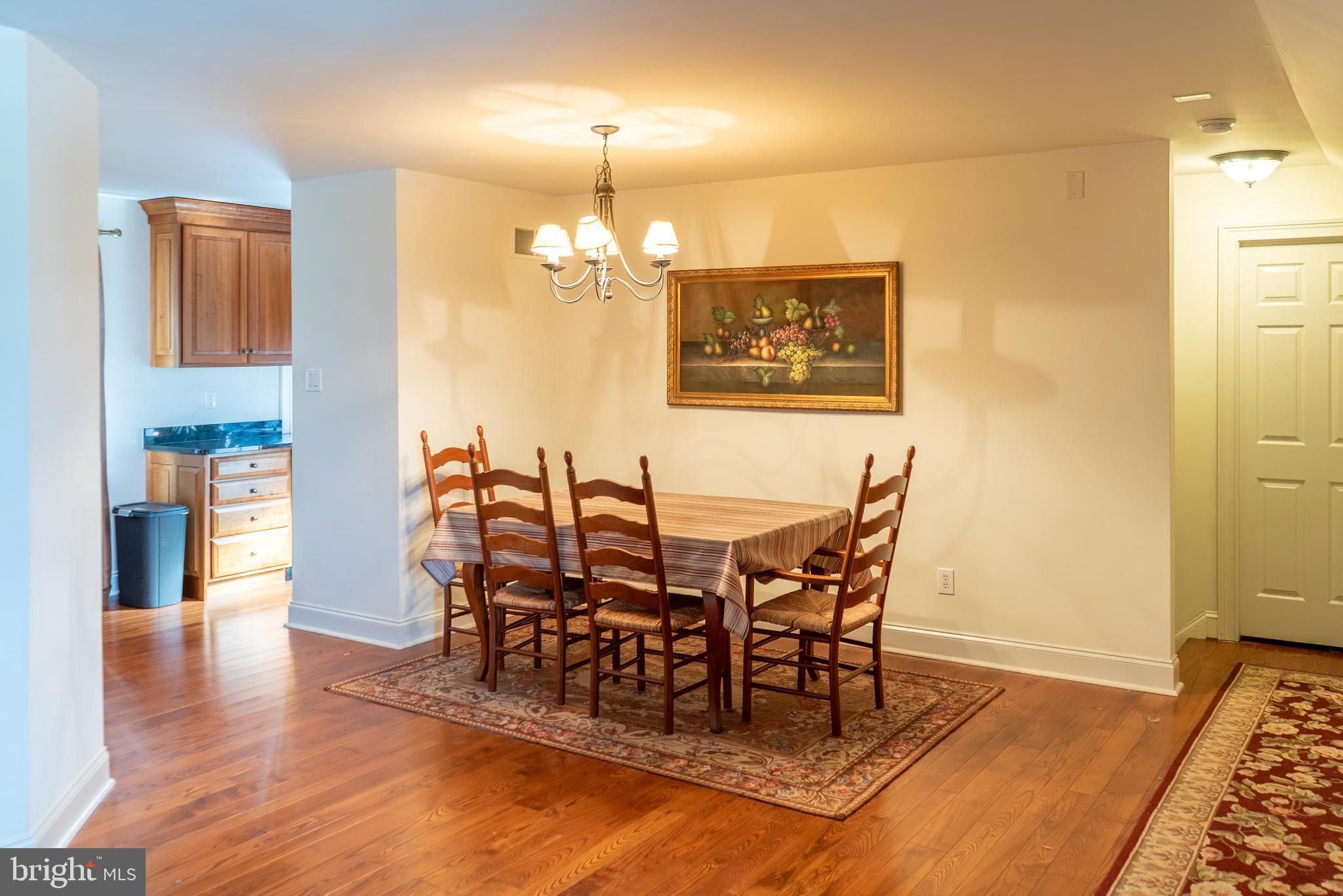 1160 Jefferson Lane Huntingdon Valley, PA 19006 - Photo 71 of 98 a view of a dining room with furniture and wooden floor