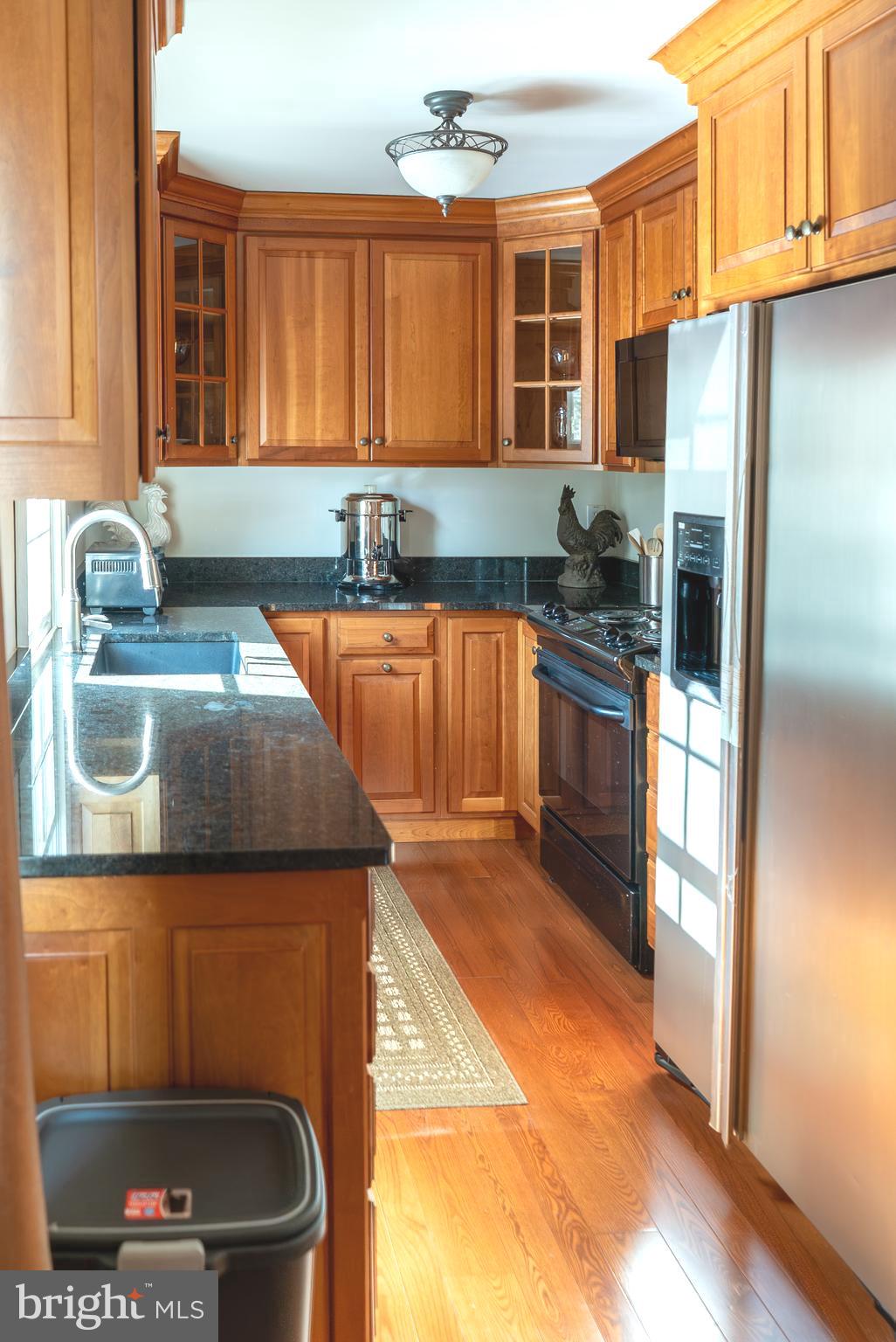 1160 Jefferson Lane Huntingdon Valley, PA 19006 - Photo 72 of 98 a kitchen with a sink a stove and refrigerator