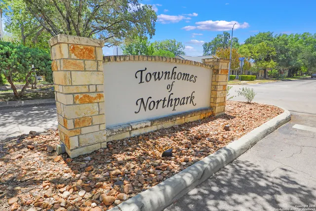 a sign on the side of the road