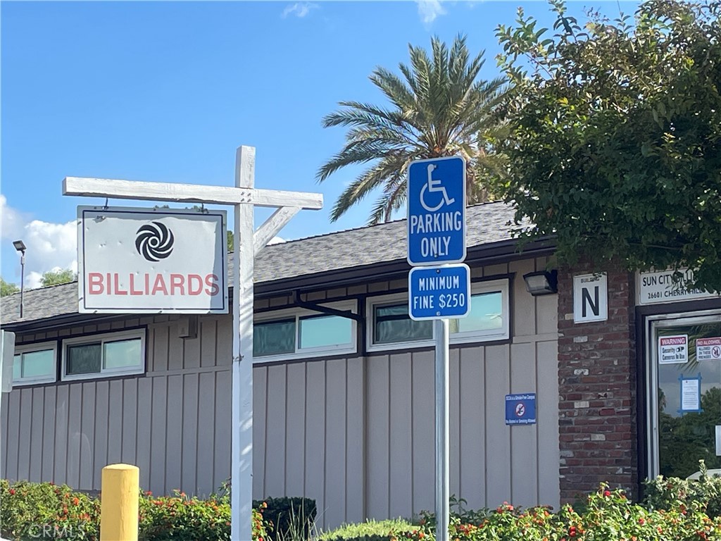 26480 Ridgemoor Road Menifee, CA 92586 - Photo 29 of 32 a sign that is on a pole