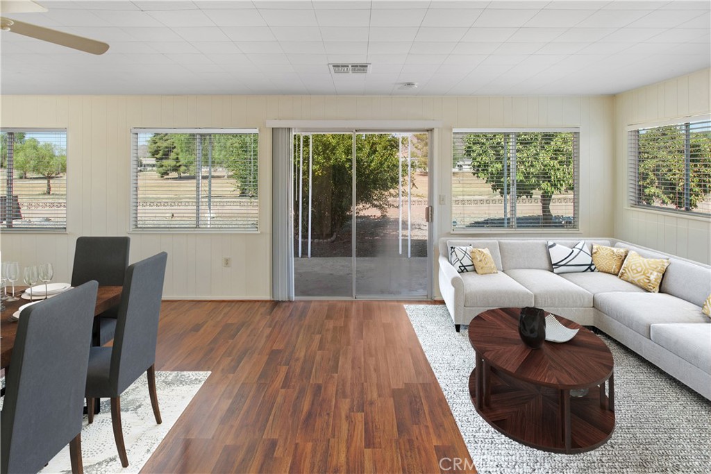 26480 Ridgemoor Road Menifee, CA 92586 - Photo 7 of 32 a living room with furniture and a large window
