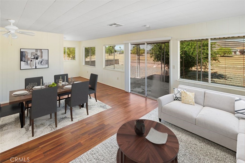26480 Ridgemoor Road Menifee, CA 92586 - Photo 8 of 32 a living room with furniture and a large window