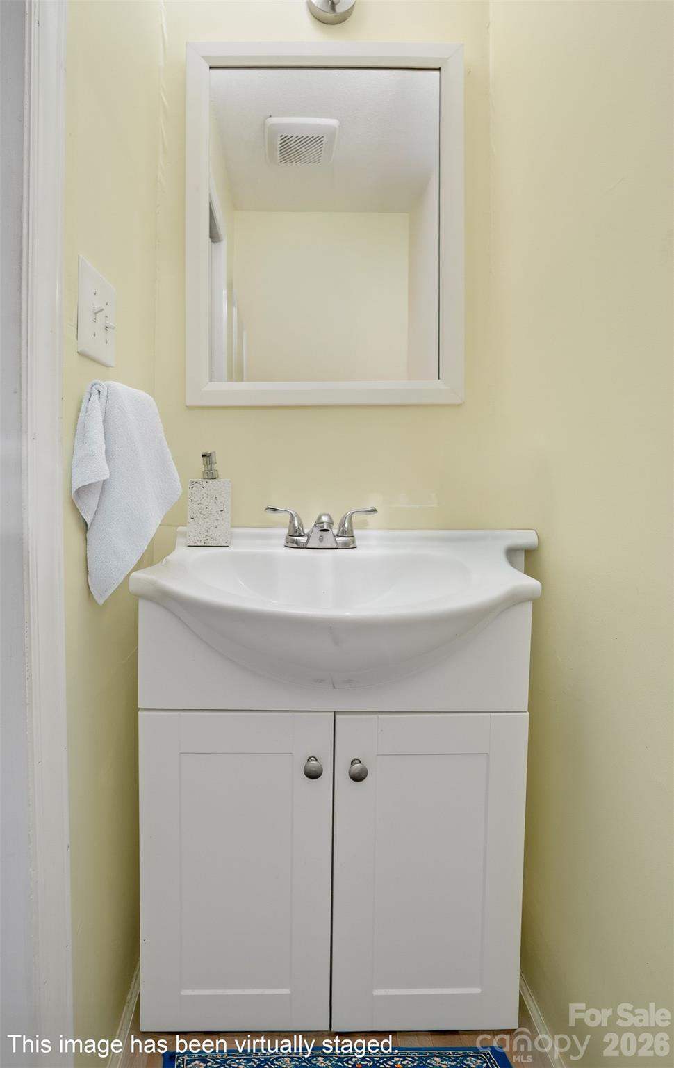 106 Blacksnake Road Stanley, NC 28164 - Photo 13 of 18 a bathroom with a sink and a mirror