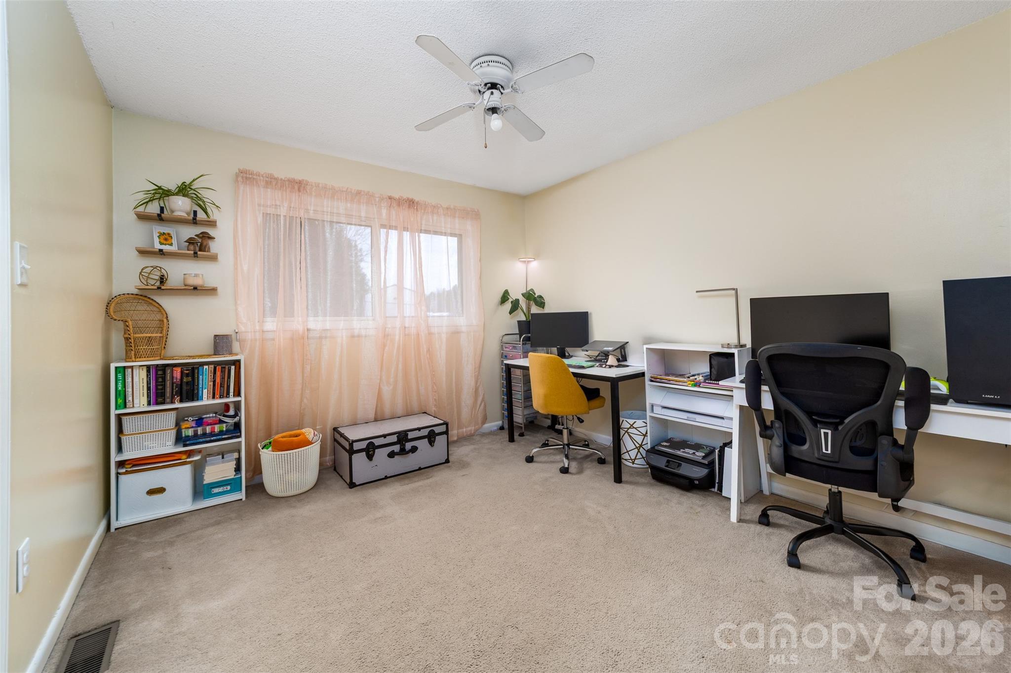106 Blacksnake Road Stanley, NC 28164 - Photo 16 of 18 a view of a workspace with furniture and a window