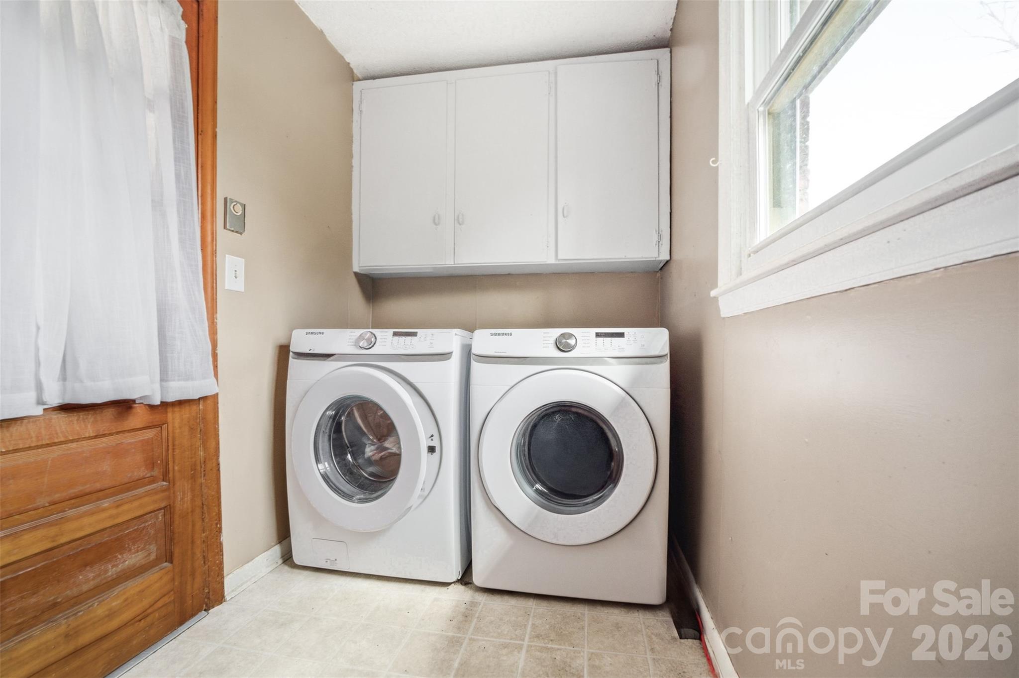 106 Blacksnake Road Stanley, NC 28164 - Photo 17 of 18 a utility room with dryer and washer
