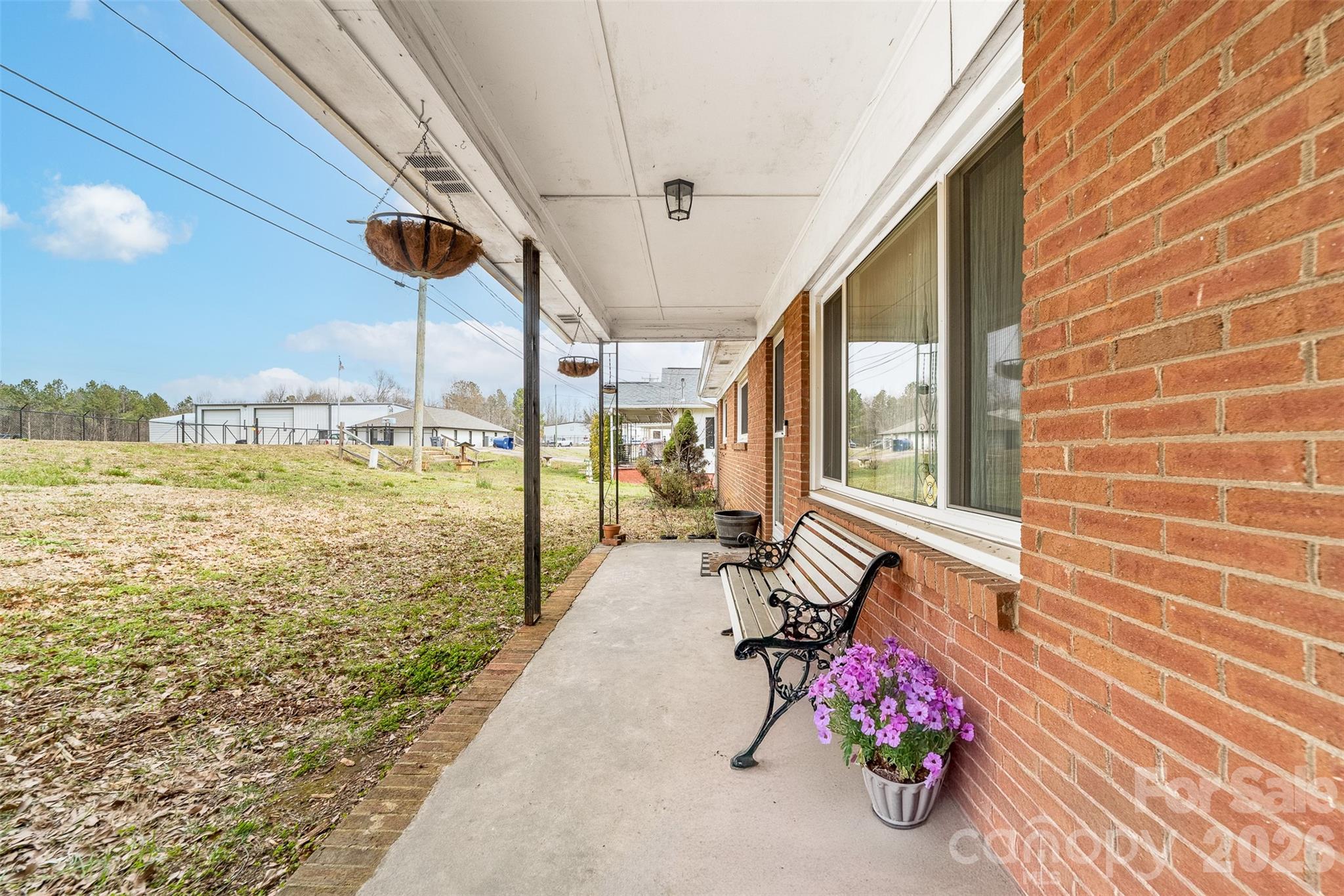 106 Blacksnake Road Stanley, NC 28164 - Photo 2 of 18 a view of a ocean with lawn chairs