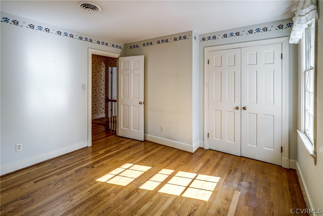 9402 Midvale Road Henrico, VA 23229 - Photo 23 of 33 Bedroom with Hardwood Floors and Closet