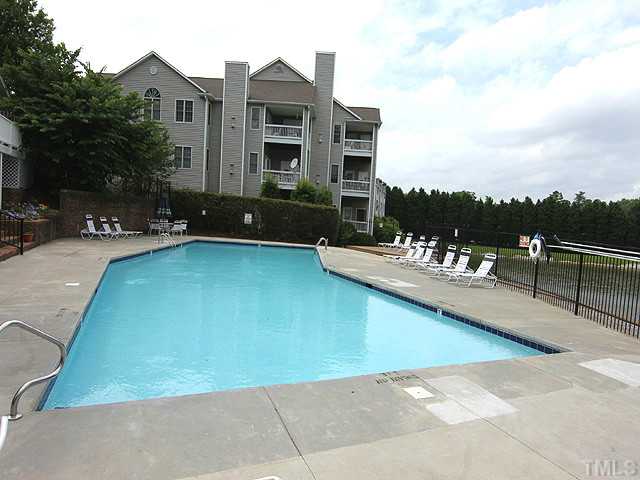 522 Springfork Drive Cary, NC 27513 - Photo 11 of 13 The pool and clubhouse are located right next to the condo!