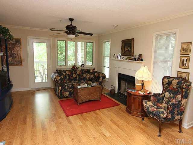 522 Springfork Drive Cary, NC 27513 - Photo 3 of 13 Wood burning fireplace and a great view!