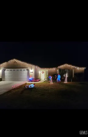 a front view of a house with yard