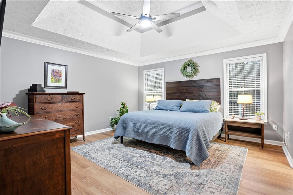 125 Cardinal Court Covington, GA 30016 - Photo 13 of 37 a bedroom with a bed and a dresser