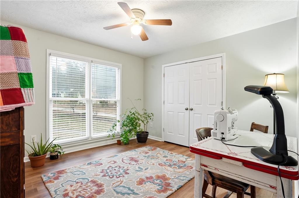 125 Cardinal Court Covington, GA 30016 - Photo 22 of 37 a bedroom with a bed and a window