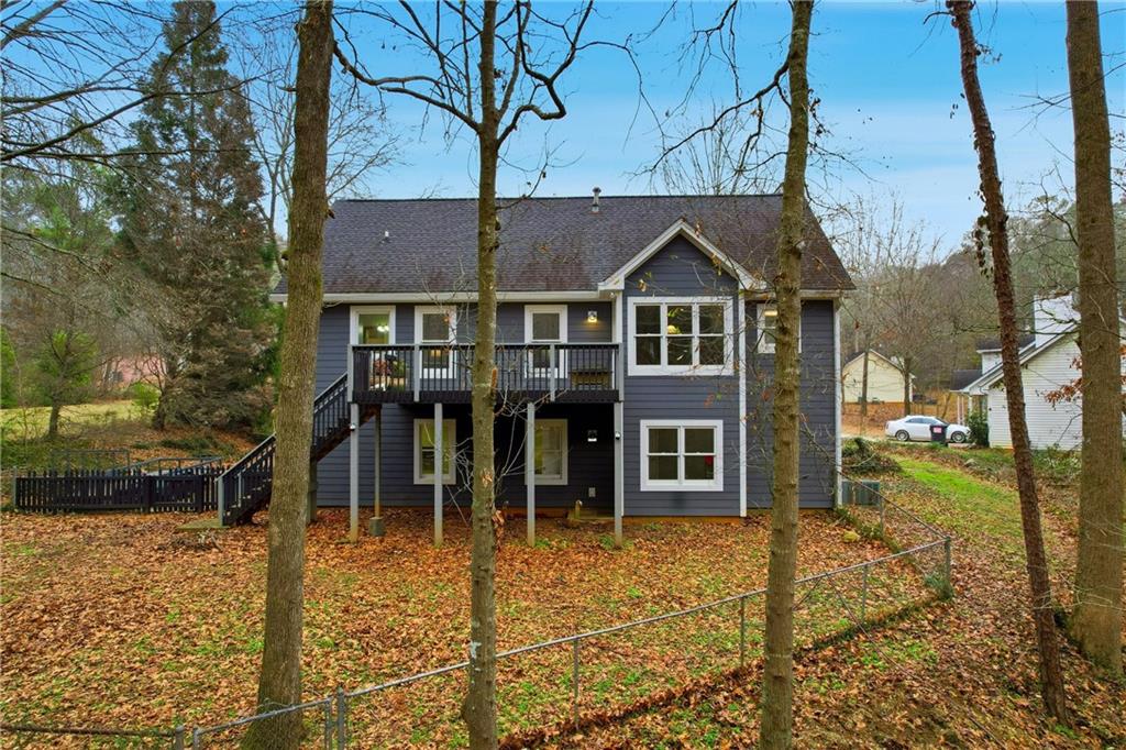 125 Cardinal Court Covington, GA 30016 - Photo 32 of 37 front view of a house with a yard