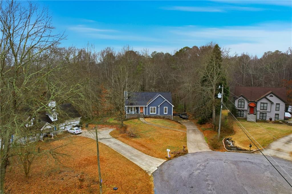 125 Cardinal Court Covington, GA 30016 - Photo 34 of 37 a view of a swimming pool with a patio