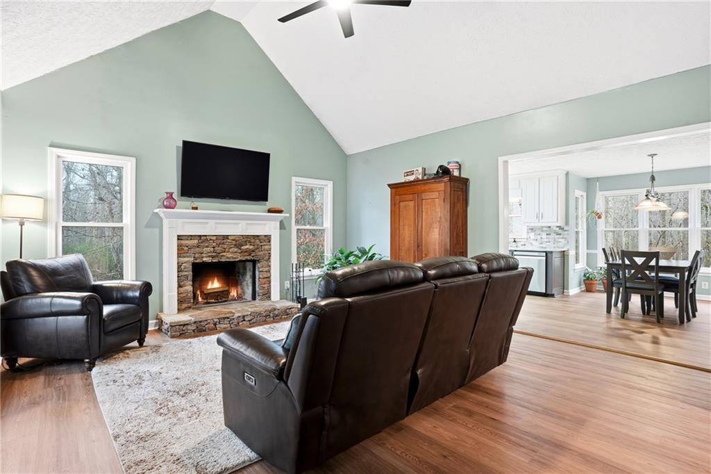 125 Cardinal Court Covington, GA 30016 - Photo 8 of 37 a living room with furniture and a fireplace