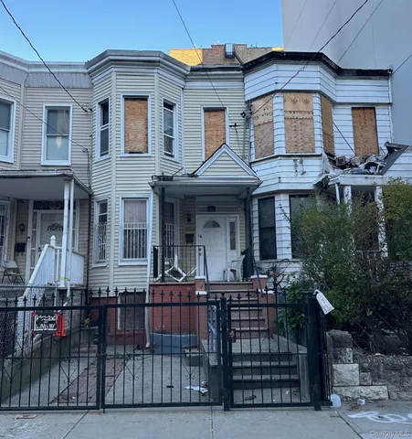 a front view of a house with glass windows