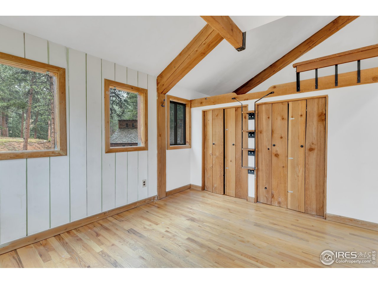 926 Mountain Meadows Road Boulder, CO 80302 - Photo 21 of 38 a view of an entryway with wooden floor