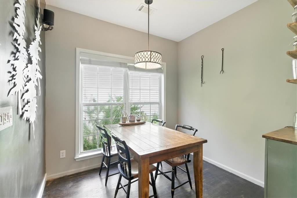 120 Quarrington Court Milton, GA 30004 - Photo 17 of 48 a view of a dining room with furniture window and wooden floor