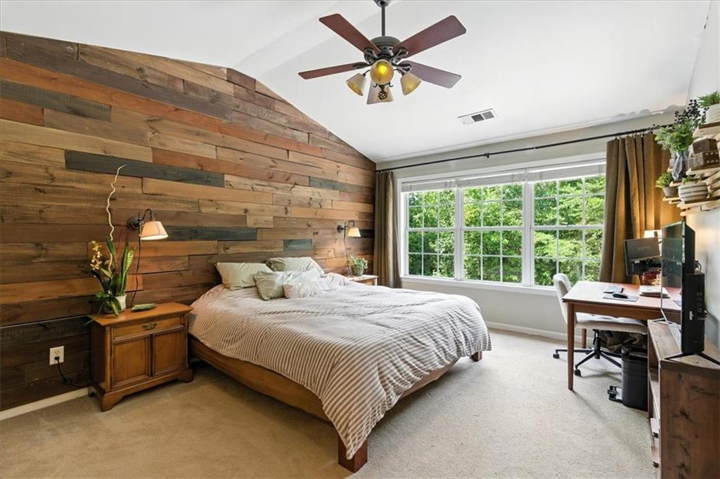 120 Quarrington Court Milton, GA 30004 - Photo 21 of 48 a bedroom with a bed and a large window