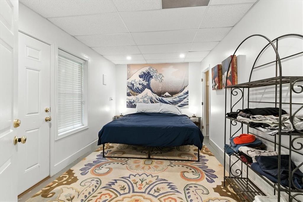 120 Quarrington Court Milton, GA 30004 - Photo 32 of 48 a bedroom with furniture and a window