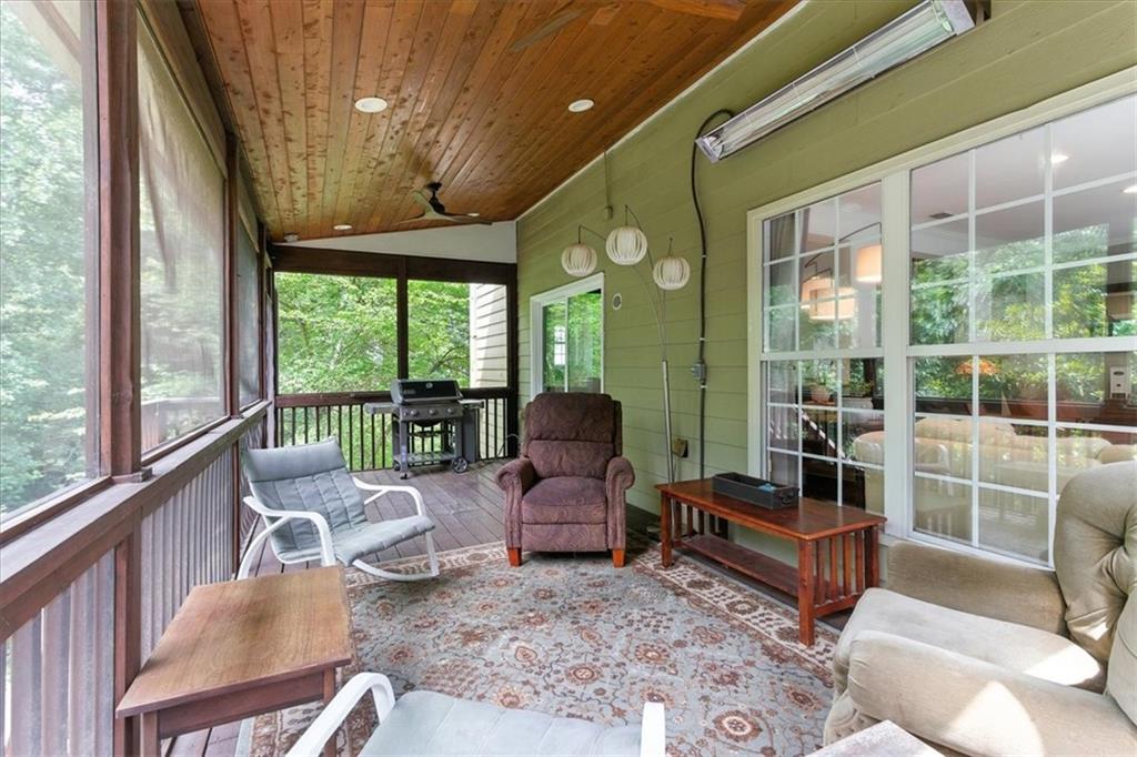 120 Quarrington Court Milton, GA 30004 - Photo 36 of 48 a living room with furniture and a large window