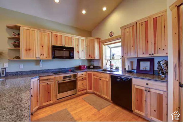 1735 West Pinyon Hls Road Hatch, UT 84735 - Photo 4 of 21 Vaulted ceiling with recessed lighting, wood-finish flooring, wood cabinetry with exposed grain, built-in stainless steel oven, and an undermount sink
