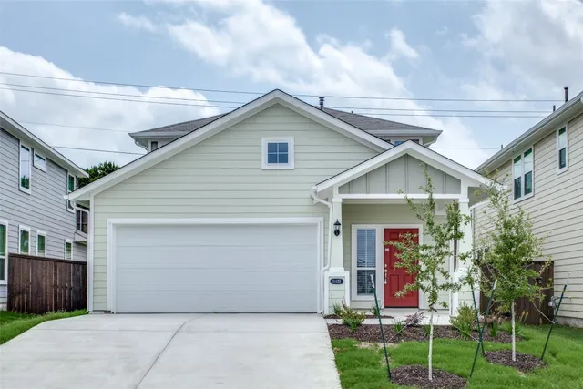 a front view of house with yard