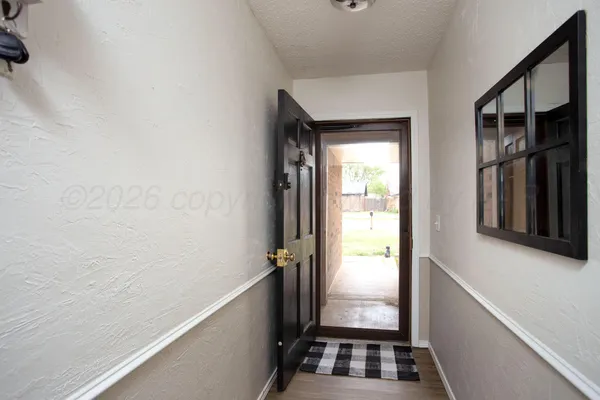 a view of hallway with stairs