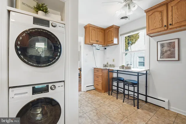 a view of a storage & utility room with washer and dryer