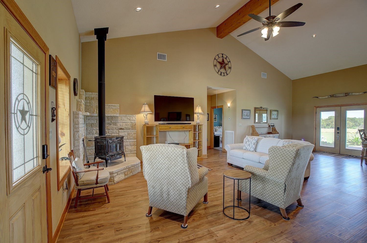 9414 Laird Road Round Top, TX 78954 - Photo 19 of 50 Close up photo of Living room area, TV to remain and super high ceilings