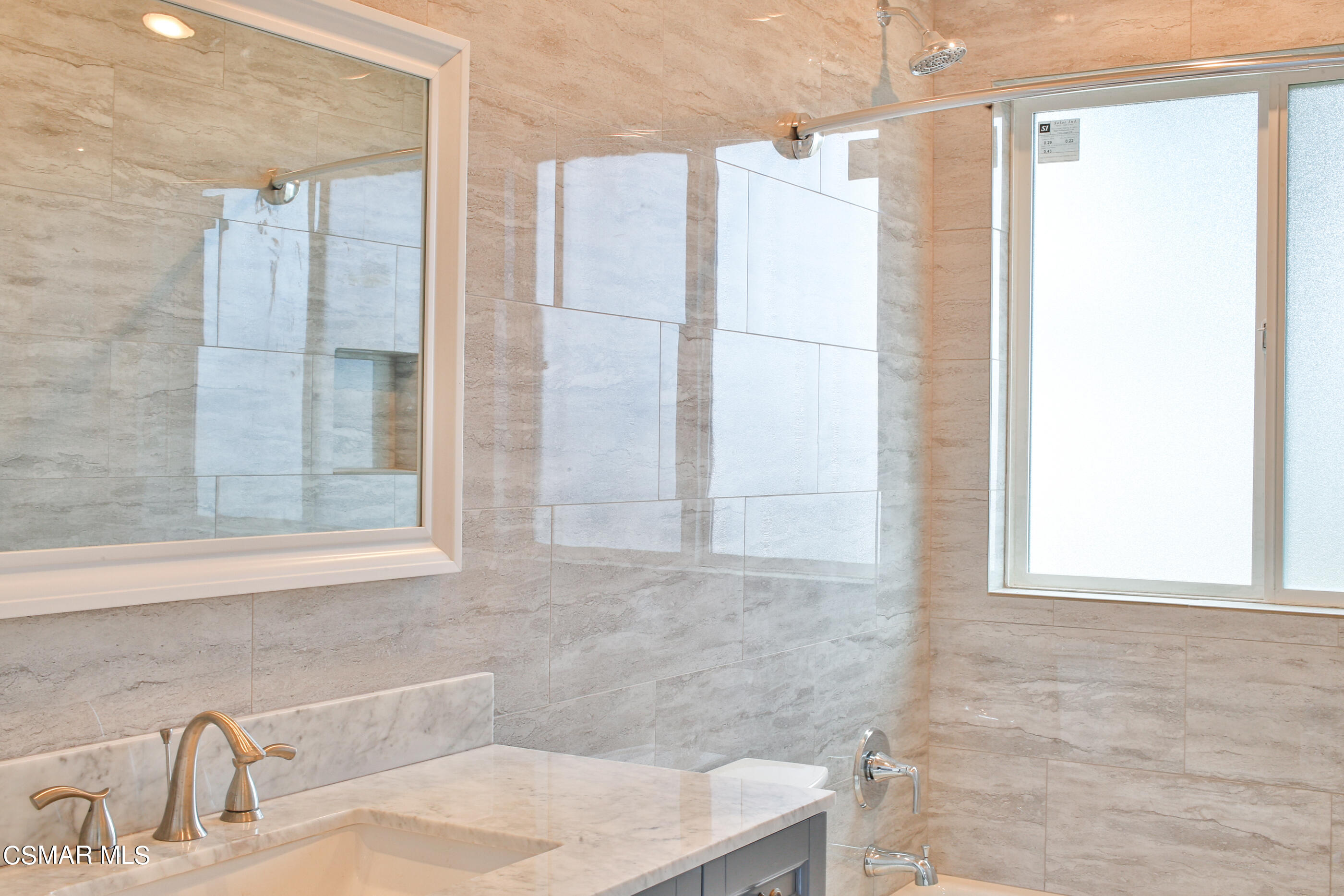 3836 Dalaway Drive Moorpark, CA 93021 - Photo 26 of 29 a bathroom with a sink and a shower