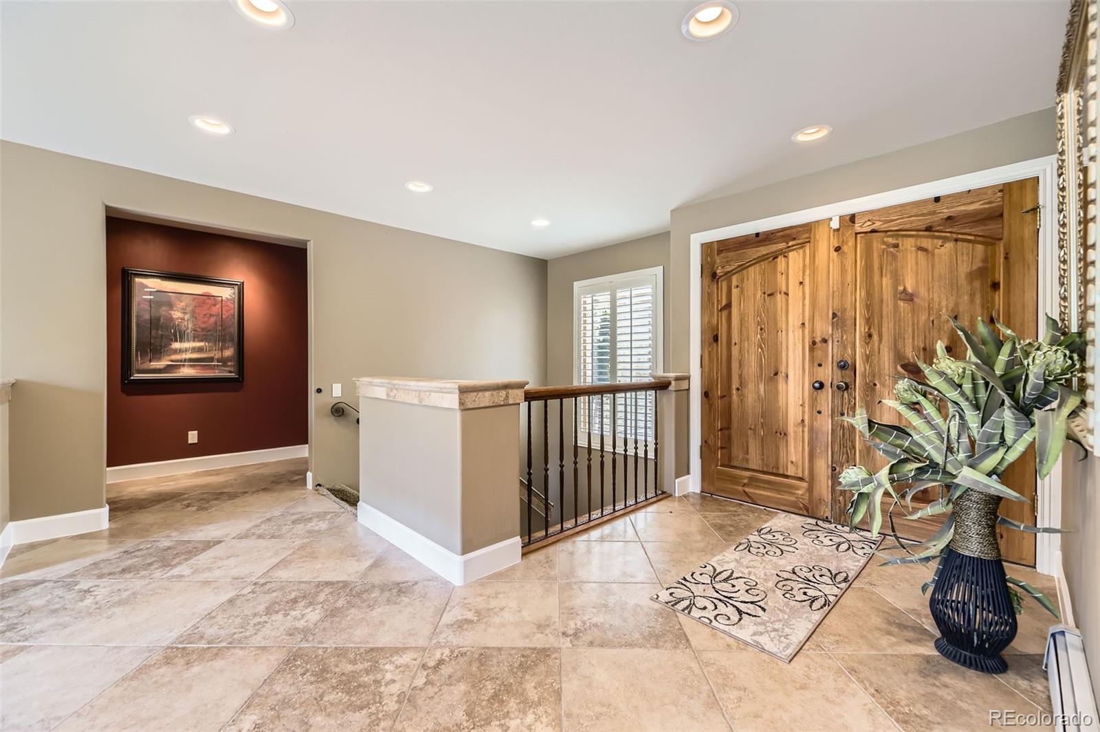 11274 East Manitou Road Franktown, CO 80116 - Photo 30 of 46 a view of entryway with livingroom