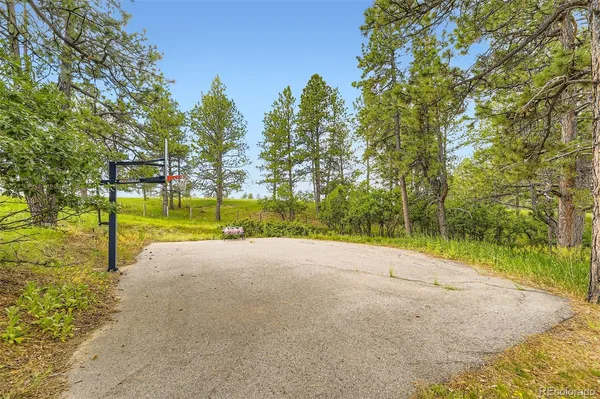 a view of a road with a yard