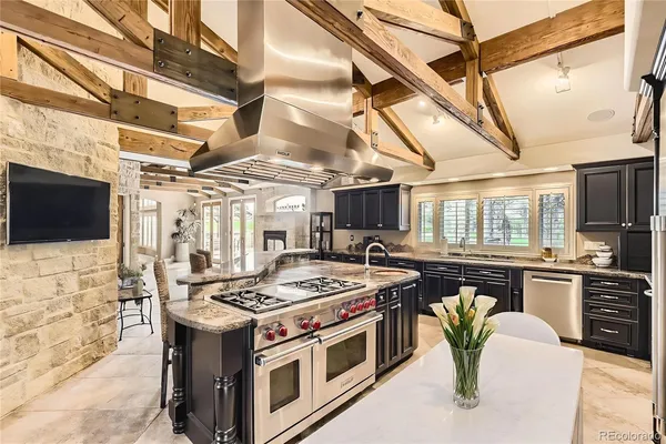 a kitchen with a stove and a microwave
