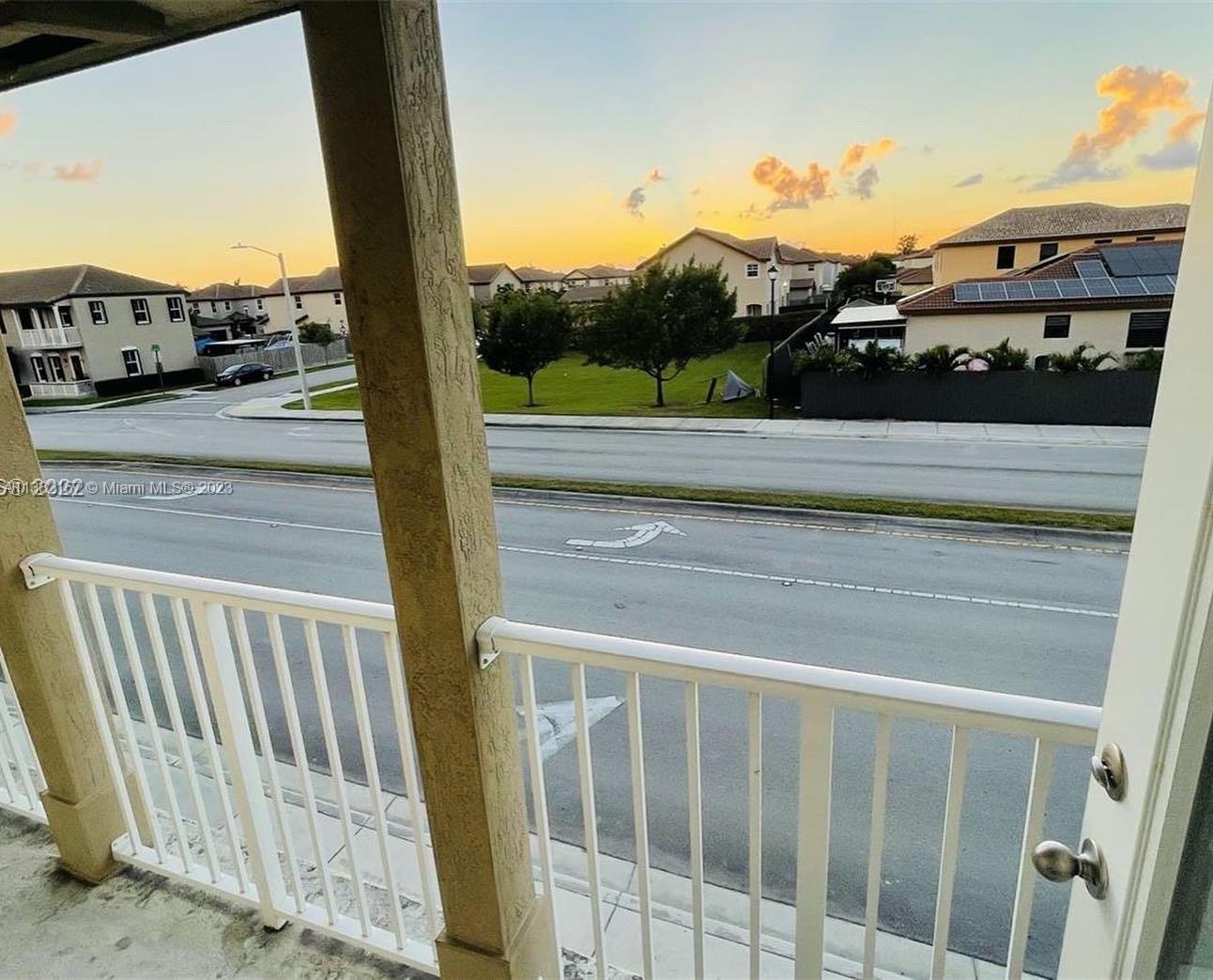 24257 Southwest 117th Avenue Homestead, FL 33032 - Photo 19 of 27 a view of a balcony with city view