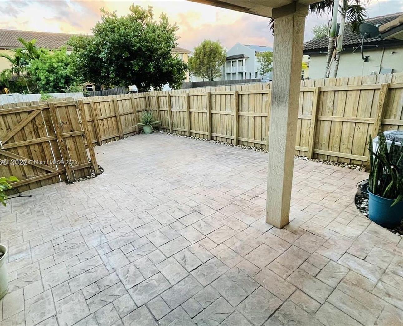 24257 Southwest 117th Avenue Homestead, FL 33032 - Photo 6 of 27 a view of a backyard