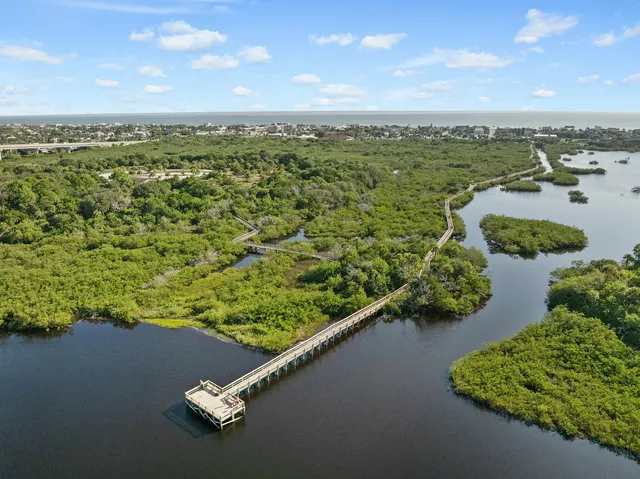 a view of a city from a lake view