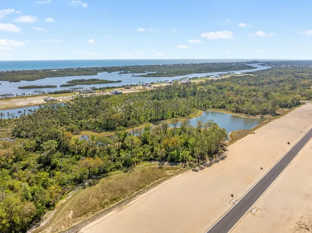 a view of an ocean and mountain