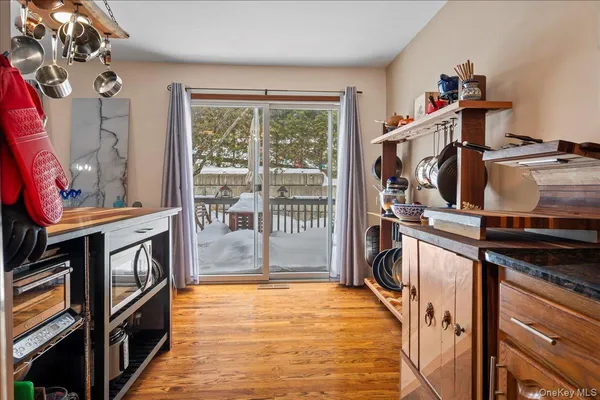 a kitchen with stainless steel appliances granite countertop a stove and a refrigerator