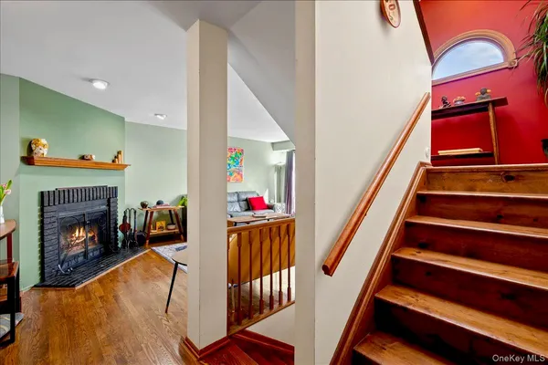 a bathroom with a sink mirror vanity and toilet