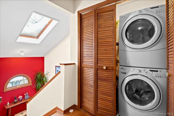 a bed room with bed and a window