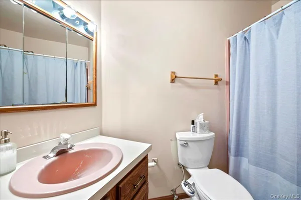 a view of a workspace with furniture and toys