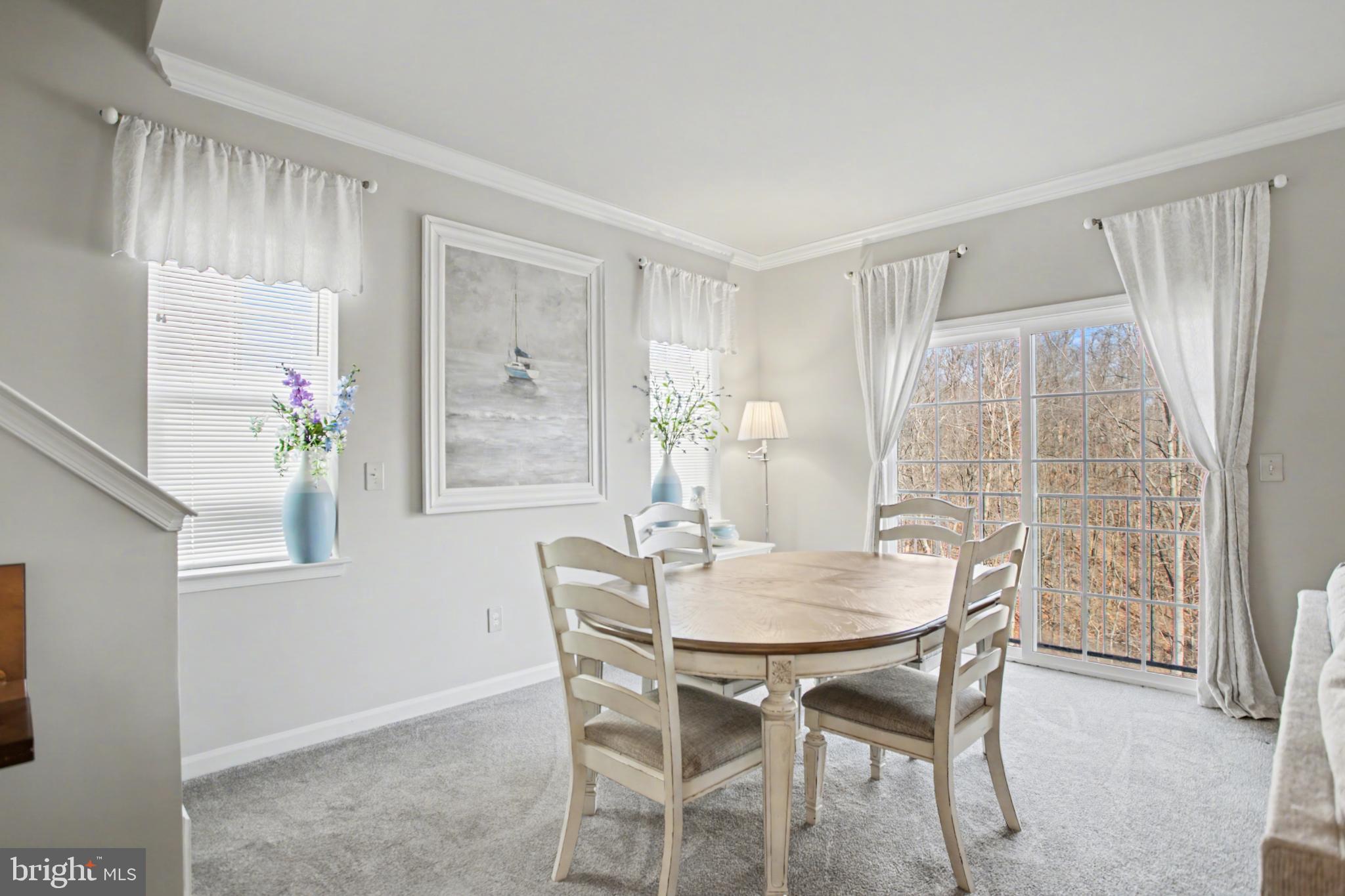 225 Patchwork Drive Stephenson, VA 22656 - Photo 11 of 32 Bright and airy dining space with nature views.