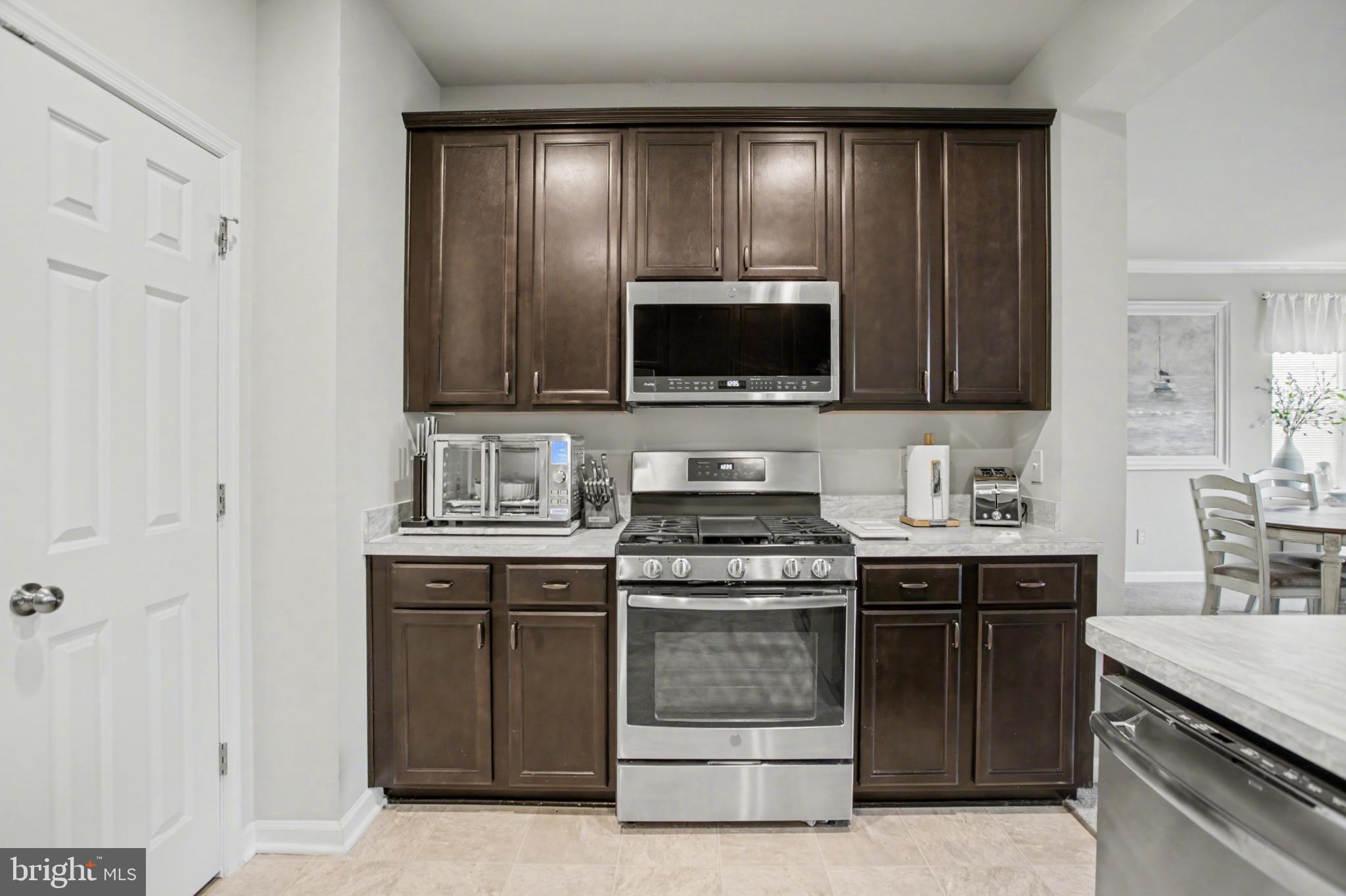 225 Patchwork Drive Stephenson, VA 22656 - Photo 18 of 32 Modern kitchen with sleek cabinetry.